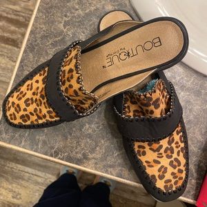 Cute leather mules. Wore once. Black with leopard print on top. Very cushiony.